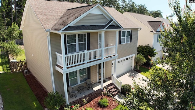 458 Laurel Mist Ln, West Columbia, SC 29170 - view of front facade featuring a porch, an attached garage, driveway, a balcony, and a shingled roof