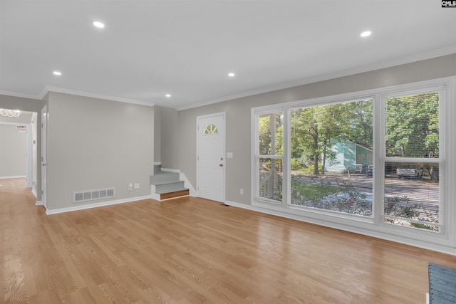 2 Westpine Ct, Columbia, SC 29212 - unfurnished living room featuring stairway, recessed lighting, crown molding, and light wood finished floors