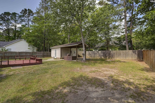 4 Rosepine Dr, Columbia, SC 29223 - fenced backyard with a deck, an outbuilding, and view of scattered trees