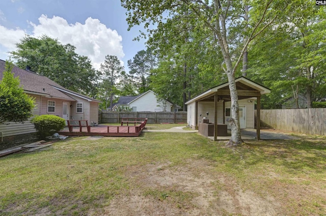 4 Rosepine Dr, Columbia, SC 29223 - fenced backyard featuring a wooden deck and an outdoor structure