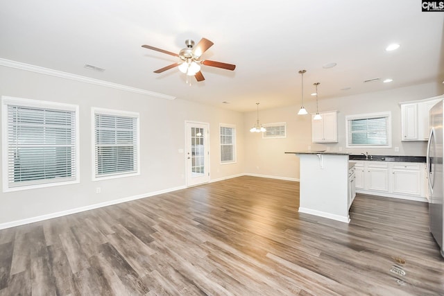779 Dawsons Park Way, Lexington, SC 29072 - kitchen featuring a ceiling fan, open floor plan, white cabinets, a chandelier, and recessed lighting