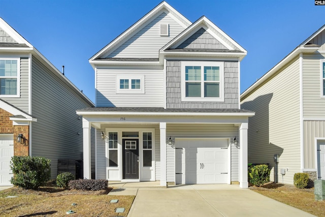 756 Dawsons Park Way, Lexington, SC 29072 - view of front of home with covered porch, concrete driveway, an attached garage, and roof with shingles