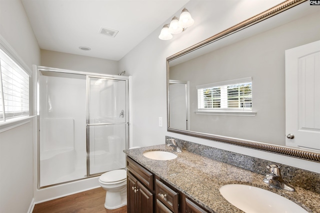 756 Dawsons Park Way, Lexington, SC 29072 - bathroom featuring a stall shower, wood finished floors, and double vanity