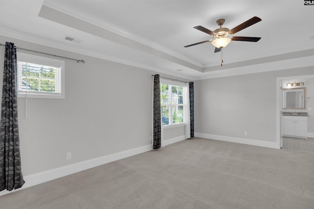 386 Amalfi Dr, Chapin, SC 29036 - unfurnished room featuring a tray ceiling, light colored carpet, ornamental molding, and ceiling fan