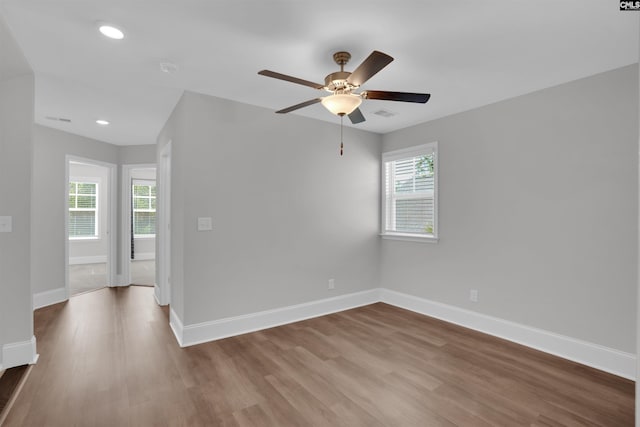 386 Amalfi Dr, Chapin, SC 29036 - unfurnished room with wood finished floors, healthy amount of natural light, ceiling fan, and recessed lighting