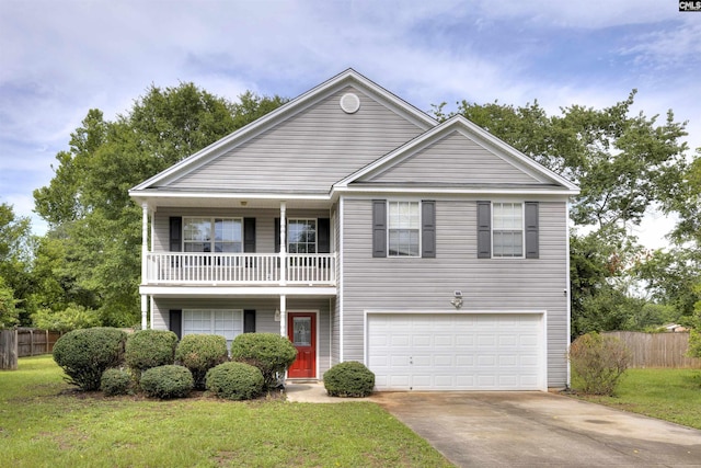 1265 Monterey Dr, Sumter, SC 29150 - view of front of home with an attached garage, driveway, and a balcony
