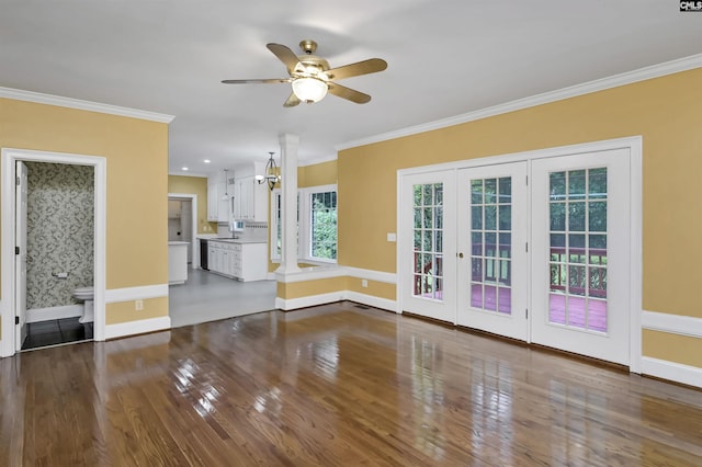 256 Sheringham Rd, Columbia, SC 29212 - unfurnished living room with ceiling fan, wood finished floors, crown molding, and french doors