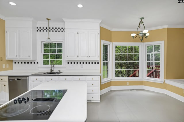 256 Sheringham Rd, Columbia, SC 29212 - kitchen featuring stainless steel dishwasher, black electric stovetop, white cabinets, a chandelier, and pendant lighting