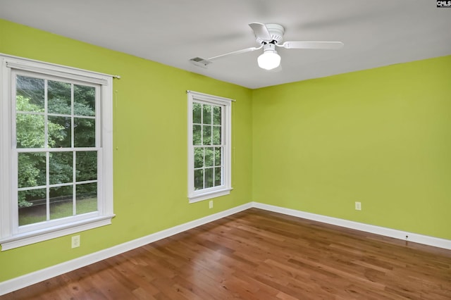 256 Sheringham Rd, Columbia, SC 29212 - empty room with wood finished floors and a ceiling fan