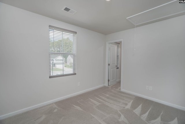 1021 Bermuda Cedar Ln, Hopkins, SC 29061 - empty room with attic access and light carpet
