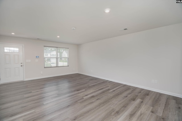 1021 Bermuda Cedar Ln, Hopkins, SC 29061 - spare room featuring wood finished floors and recessed lighting