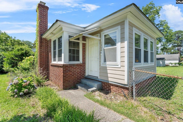 1400 Axtell Dr, Cayce, SC 29033 - view of front of property featuring entry steps and a chimney