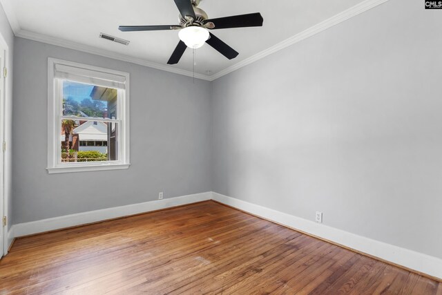 1400 Axtell Dr, Cayce, SC 29033 - unfurnished room with wood finished floors, ornamental molding, and a ceiling fan