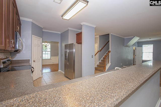 418 Abbeydale Way, Columbia, SC 29229 - kitchen with appliances with stainless steel finishes, light tile patterned floors, healthy amount of natural light, and ornamental molding