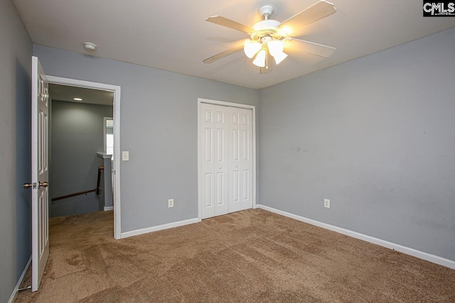418 Abbeydale Way, Columbia, SC 29229 - unfurnished bedroom featuring carpet floors, a closet, and a ceiling fan