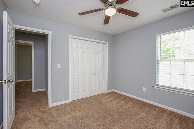418 Abbeydale Way, Columbia, SC 29229 - unfurnished bedroom with light carpet, a closet, and ceiling fan