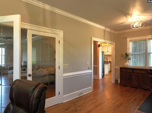 200 Weeping Cherry Ln, Columbia, SC 29212 - interior space with crown molding, wood finished floors, plenty of natural light, and a chandelier