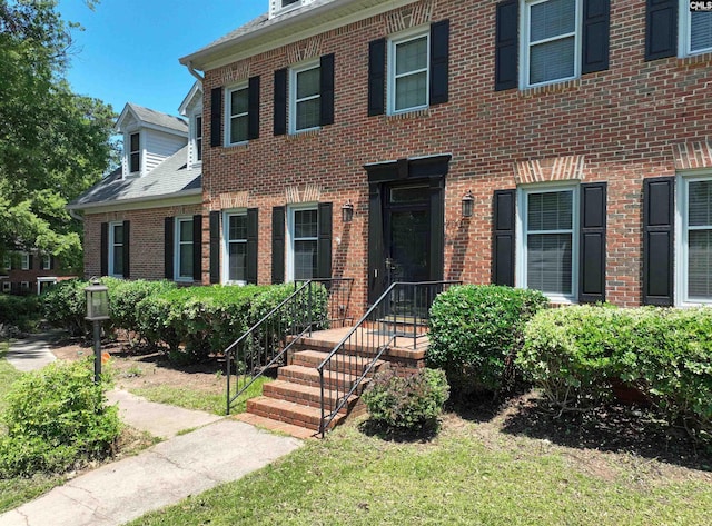 200 Weeping Cherry Ln, Columbia, SC 29212 - view of front of home featuring brick siding and a front lawn