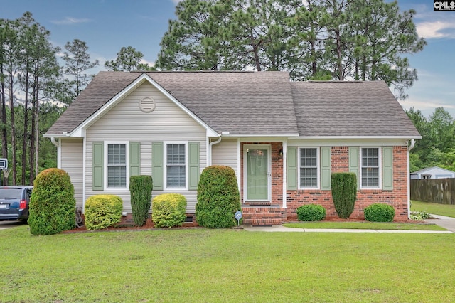 122 Halling Dr, Columbia, SC 29229 - view of front of property with a shingled roof, a front lawn, brick siding, and entry steps