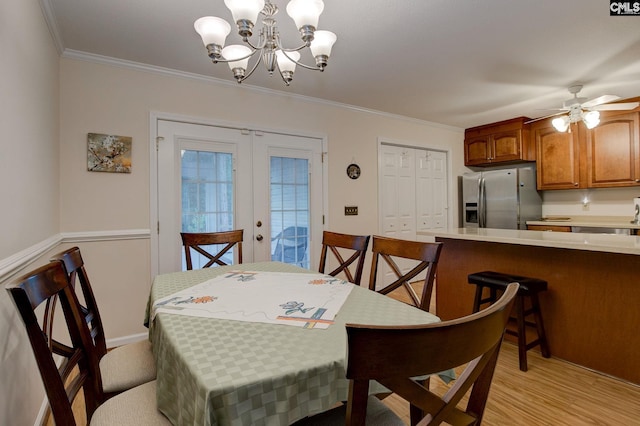 122 Halling Dr, Columbia, SC 29229 - dining area with french doors, ornamental molding, a chandelier, light wood-type flooring, and a ceiling fan