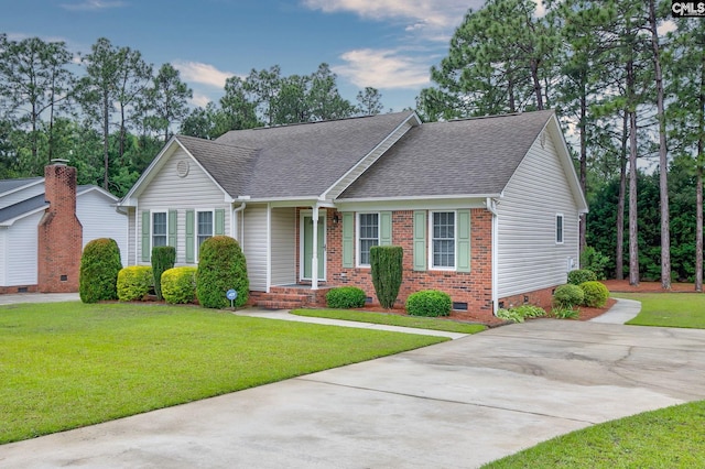 122 Halling Dr, Columbia, SC 29229 - view of front facade featuring crawl space, roof with shingles, brick siding, and a front yard