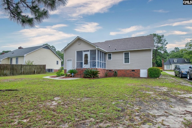 122 Halling Dr, Columbia, SC 29229 - back of house featuring a sunroom, crawl space, and a shingled roof
