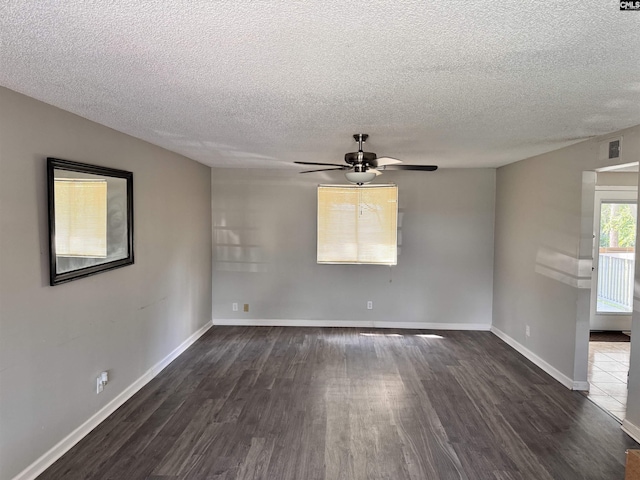 407 N Donar Dr, Columbia, SC 29229 - unfurnished room with dark wood-style flooring, a textured ceiling, and ceiling fan