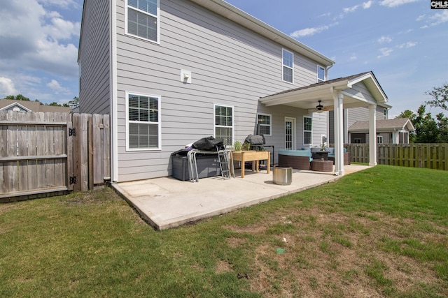 1420 Fair Forest Ln, Chapin, SC 29036 - back of property featuring a ceiling fan, a fenced backyard, an outdoor hangout area, and a patio