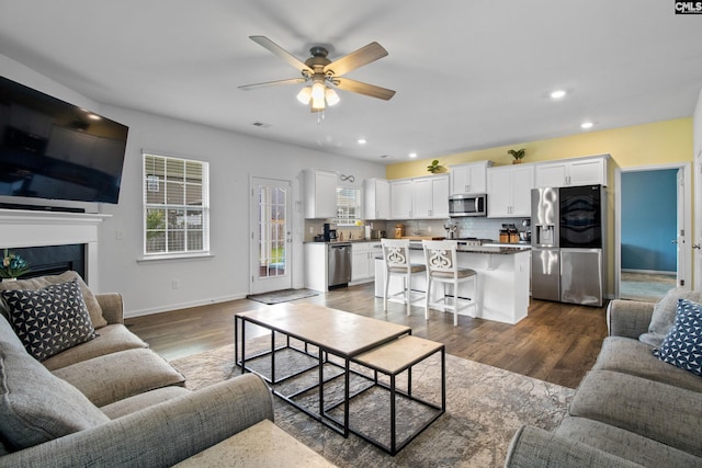 1420 Fair Forest Ln, Chapin, SC 29036 - living room with a ceiling fan, recessed lighting, dark wood-style floors, and a fireplace