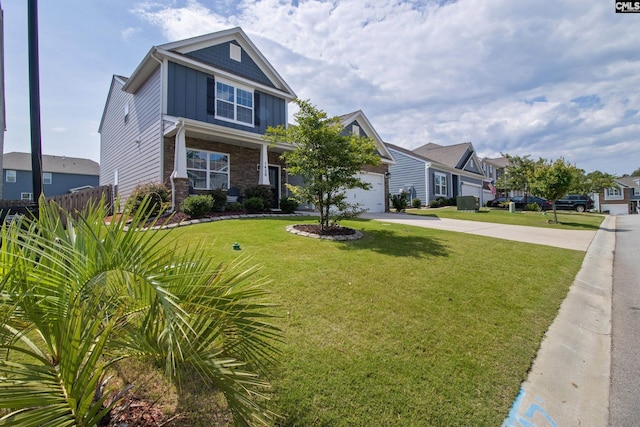 1420 Fair Forest Ln, Chapin, SC 29036 - view of front facade with board and batten siding, concrete driveway, stone siding, a residential view, and a front yard