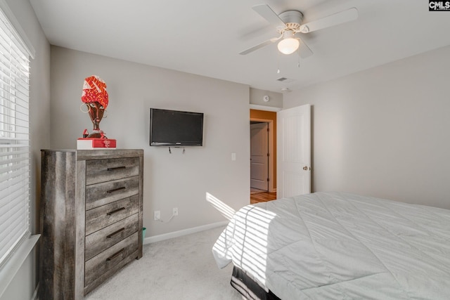 1013 Ashcroft Cir, Columbia, SC 29229 - bedroom with light carpet and a ceiling fan