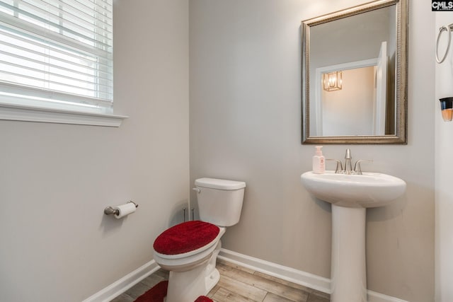 1013 Ashcroft Cir, Columbia, SC 29229 - bathroom featuring toilet and wood finished floors