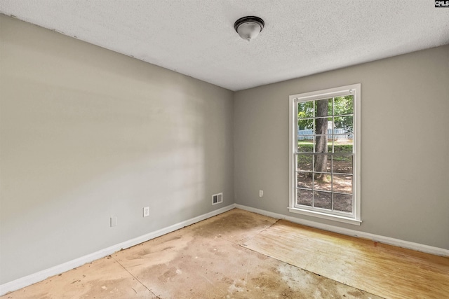 247 Piney Grove Rd, Columbia, SC 29210 - empty room featuring a textured ceiling and unfinished concrete floors