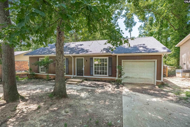 247 Piney Grove Rd, Columbia, SC 29210 - view of front facade featuring an attached garage, concrete driveway, and roof with shingles