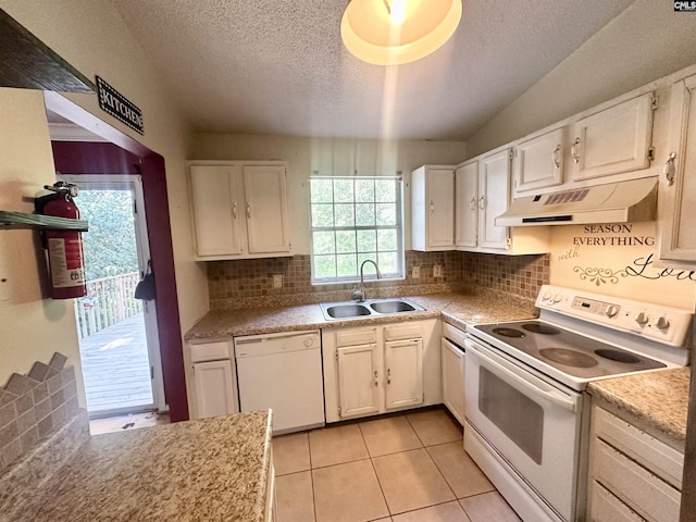 121 Durham Creek Ct, Columbia, SC 29229 - kitchen featuring white appliances, under cabinet range hood, a textured ceiling, light tile patterned floors, and white cabinets