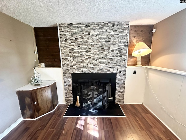 121 Durham Creek Ct, Columbia, SC 29229 - detailed view of a textured ceiling, a fireplace, and wood finished floors