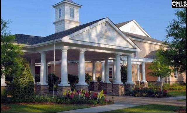 15 Alumni Ln, Blythewood, SC 29016 - view of exterior entry with covered porch and a chimney