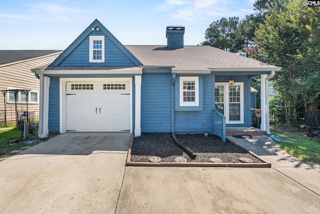 108 Sawgrass Ct, West Columbia, SC 29172 - view of front of house with a chimney, roof with shingles, and concrete driveway