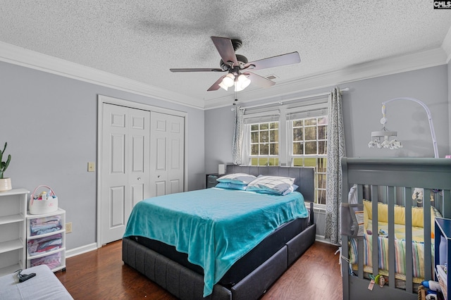 108 Sawgrass Ct, West Columbia, SC 29172 - bedroom featuring crown molding, wood finished floors, a closet, a textured ceiling, and a ceiling fan