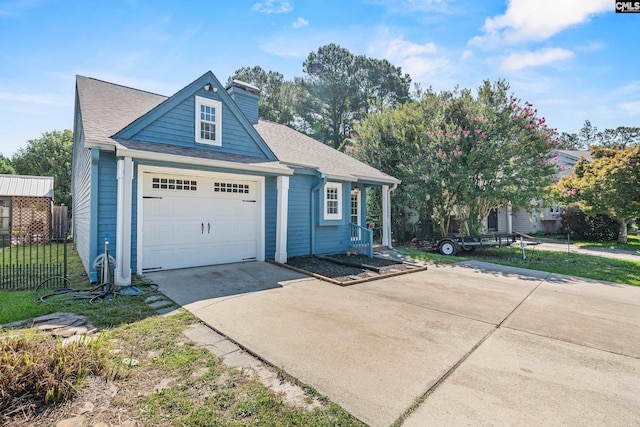 108 Sawgrass Ct, West Columbia, SC 29172 - view of front facade with concrete driveway, a chimney, an attached garage, and roof with shingles