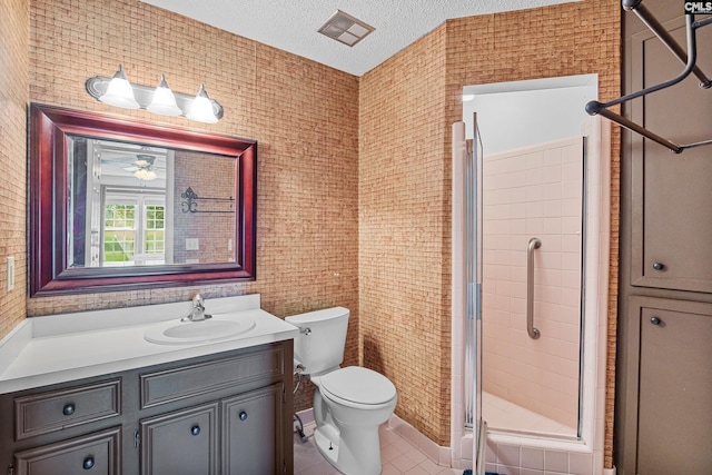 108 Sawgrass Ct, West Columbia, SC 29172 - bathroom with vanity, a shower stall, tile patterned flooring, a textured ceiling, and ceiling fan