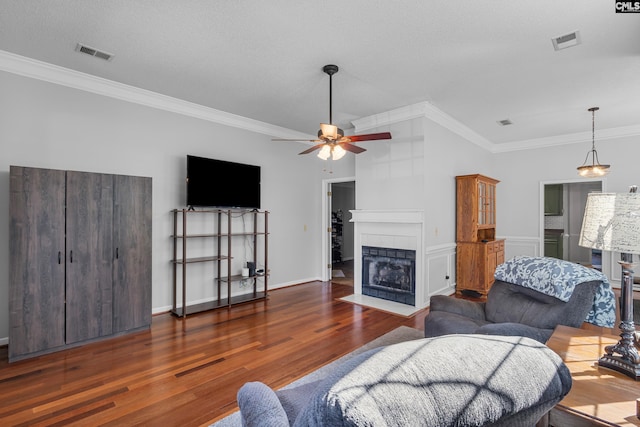 108 Sawgrass Ct, West Columbia, SC 29172 - living room with wood finished floors, ornamental molding, a ceiling fan, and a fireplace with flush hearth