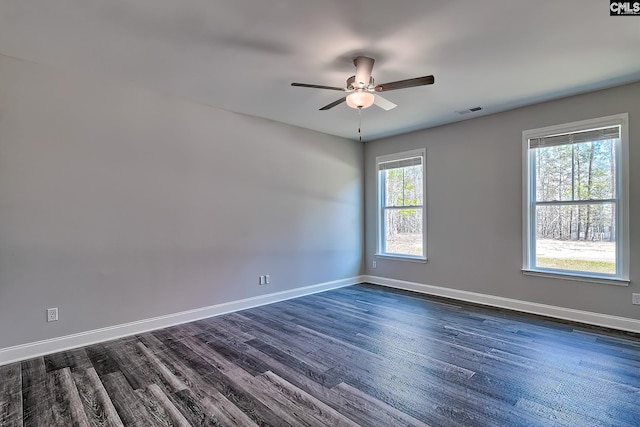 689 W Columbia Ave, Batesburg, SC 29006 - empty room featuring dark wood-style flooring and a ceiling fan