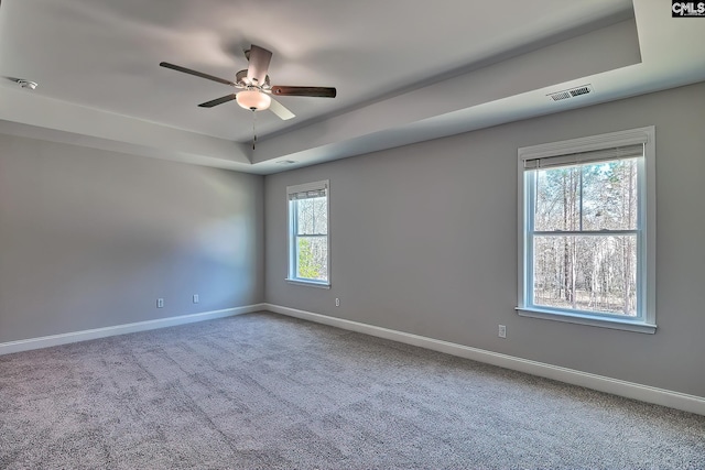 689 W Columbia Ave, Batesburg, SC 29006 - carpeted spare room with a tray ceiling, a ceiling fan, and a smoke detector