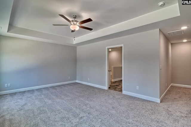 689 W Columbia Ave, Batesburg, SC 29006 - unfurnished room with carpet flooring, a ceiling fan, a smoke detector, and a raised ceiling