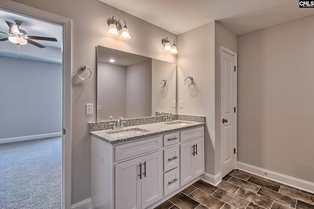689 W Columbia Ave, Batesburg, SC 29006 - full bathroom with double vanity and a ceiling fan