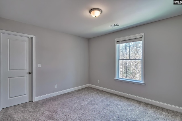 689 W Columbia Ave, Batesburg, SC 29006 - carpeted empty room with baseboards