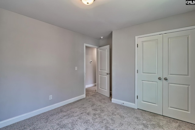 689 W Columbia Ave, Batesburg, SC 29006 - unfurnished bedroom featuring carpet floors and a closet