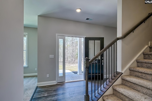 689 W Columbia Ave, Batesburg, SC 29006 - entrance foyer featuring stairway, healthy amount of natural light, and wood finished floors