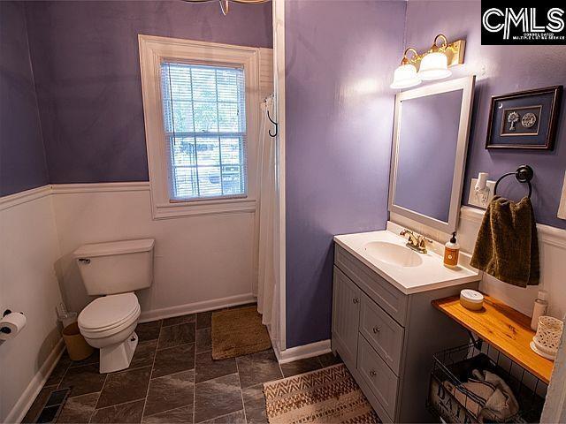 1220 Calhoun St, Newberry, SC 29108 - full bathroom featuring vanity and curtained shower